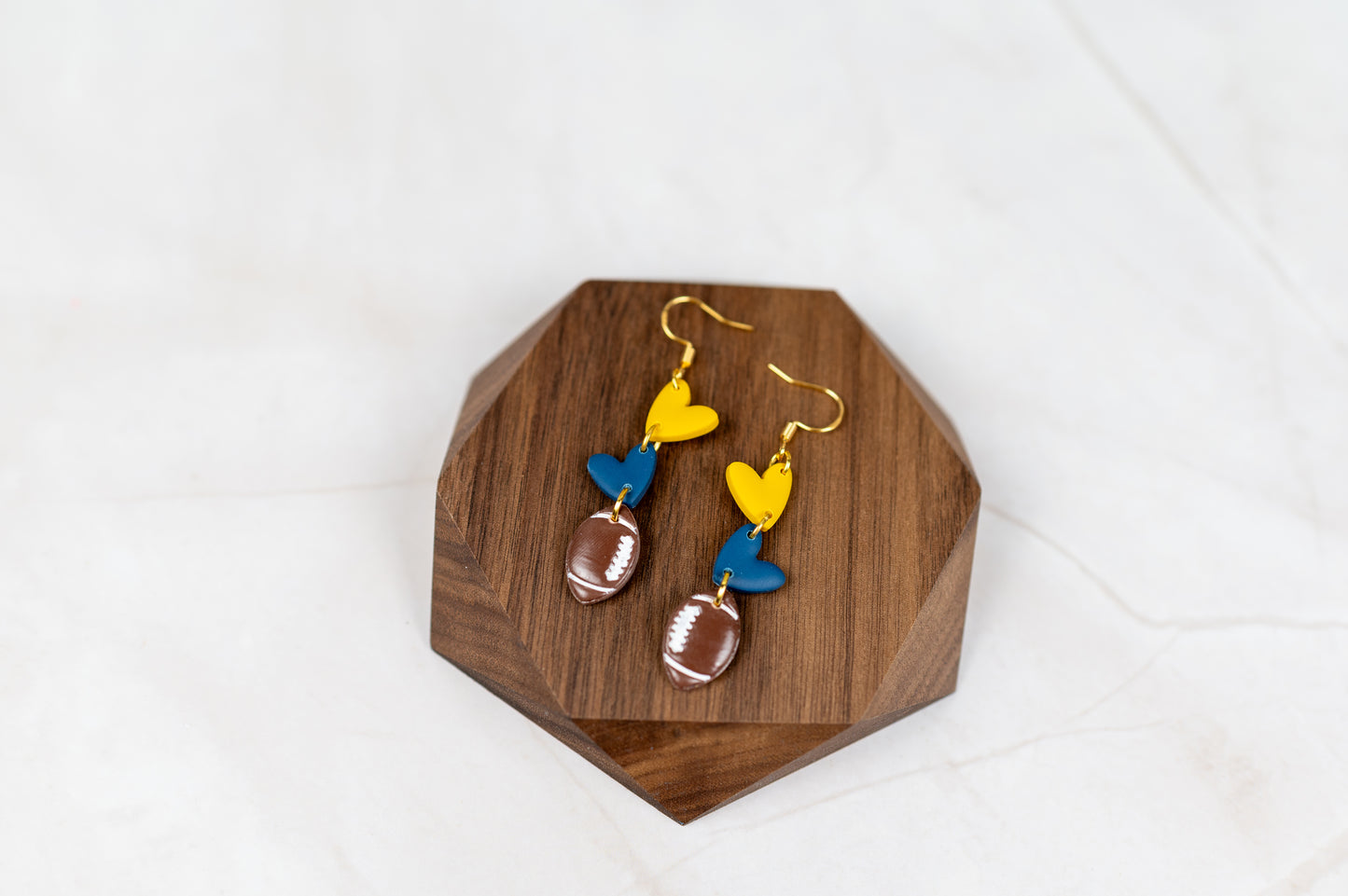 Football dangles in team colors