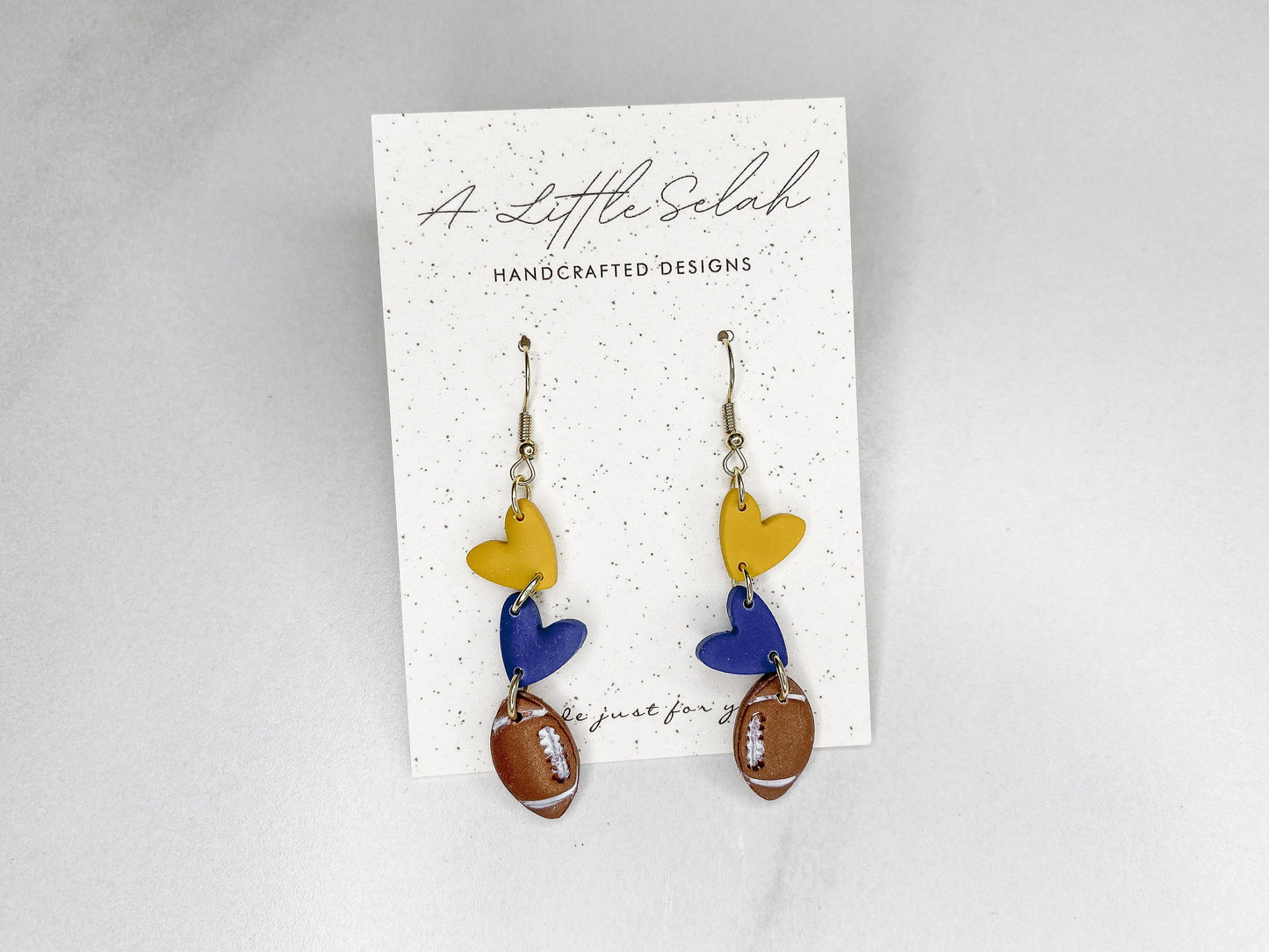 Football dangles in team colors