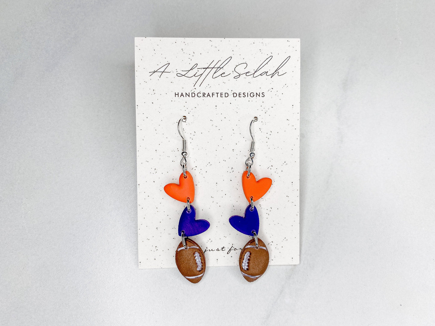 Football dangles in team colors