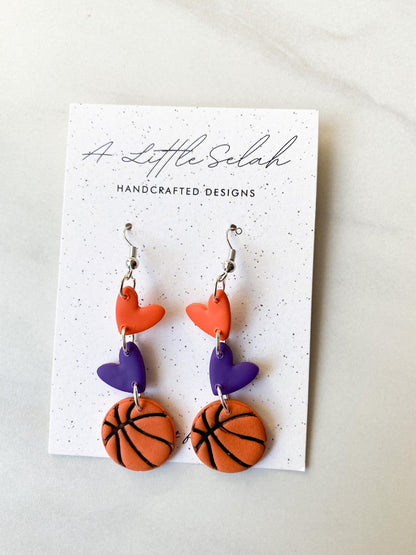 Basketball dangles in team colors