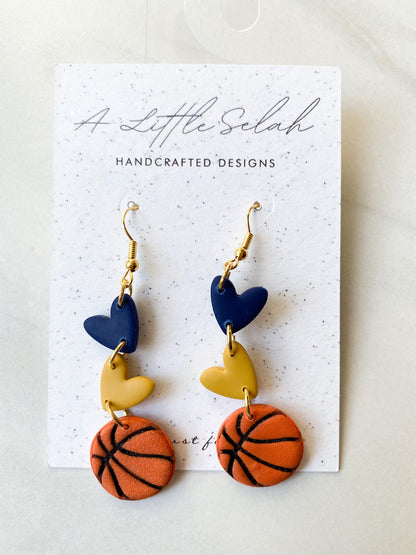 Basketball dangles in team colors