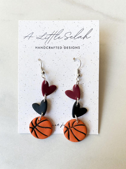 Basketball dangles in team colors